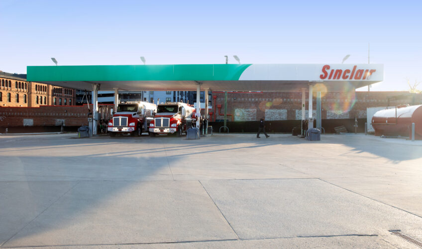 Kimbro fuel trucks at a Sinclair fueling station