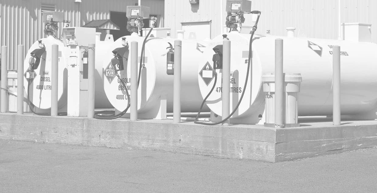 Bulk fuel storage tanks with dispensing pumps