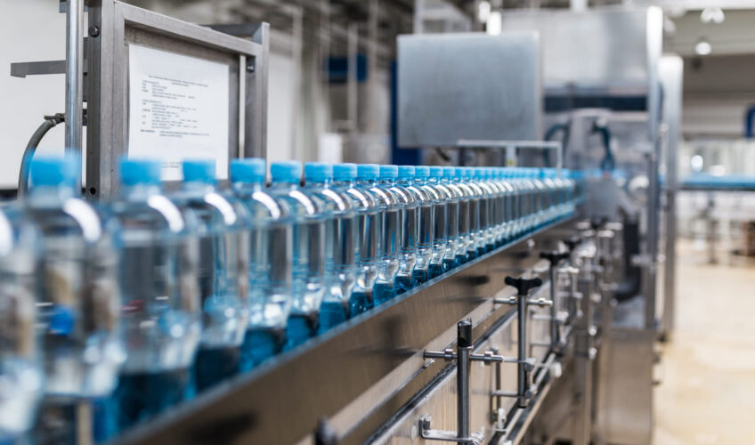 Bottled water moving along a bottling line