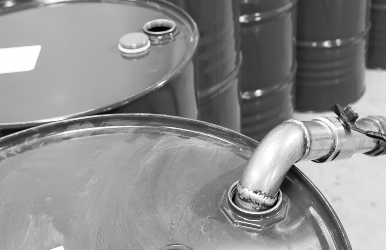 Filtration hose connected to an oil drum