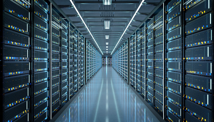 Rows of server racks lining a data center aisle