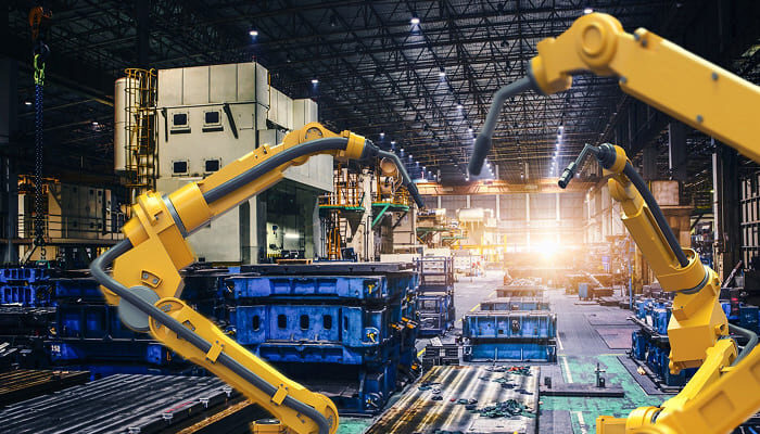 Robotic arms on a manufacturing production line