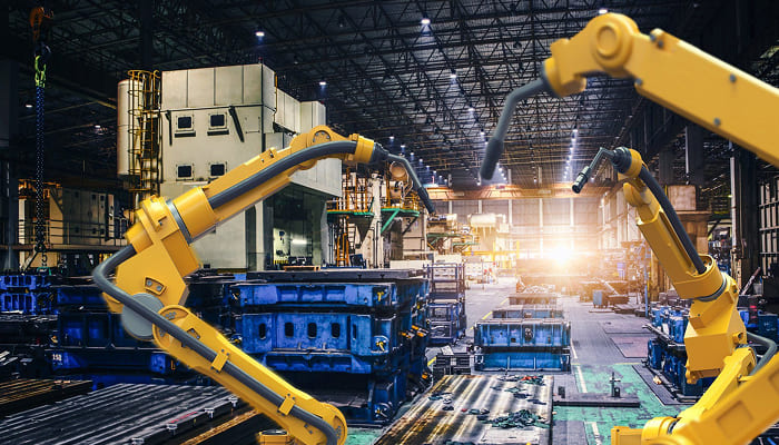 Robotic arms on a manufacturing production line