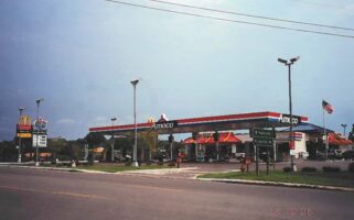 Vintage photo of a gas station along a highway